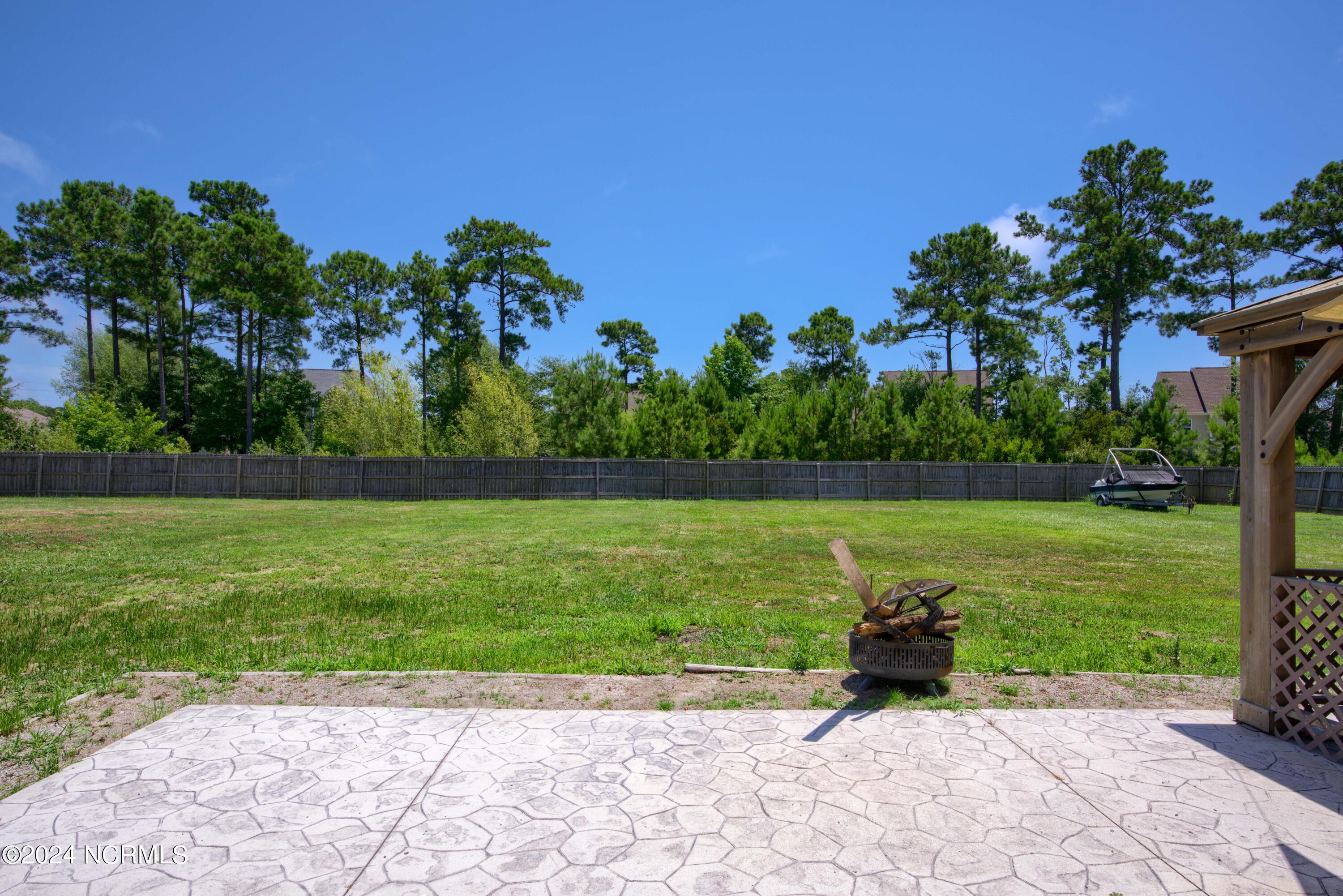 405 Saxby Way Holly Ridge, NC 28445 - Photo 10 of 54 Patio - Fenced Backyard