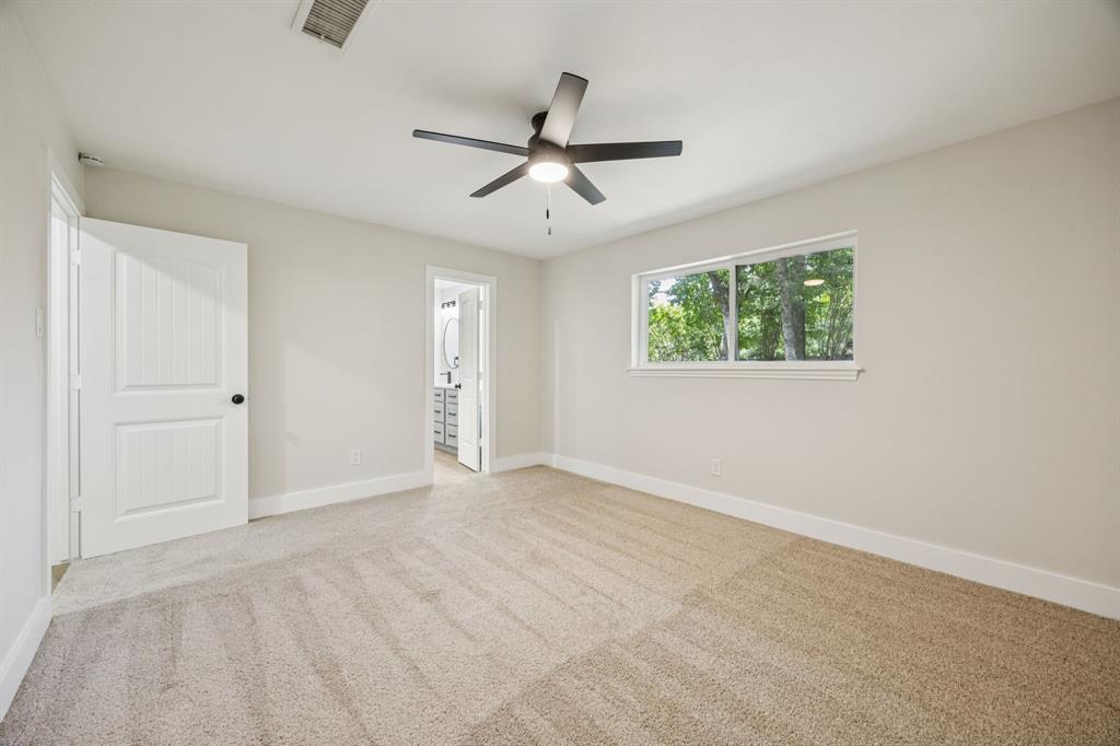 37 Devonshire Bedford, TX 76021 - Photo 31 of 39 an empty room with windows and closet