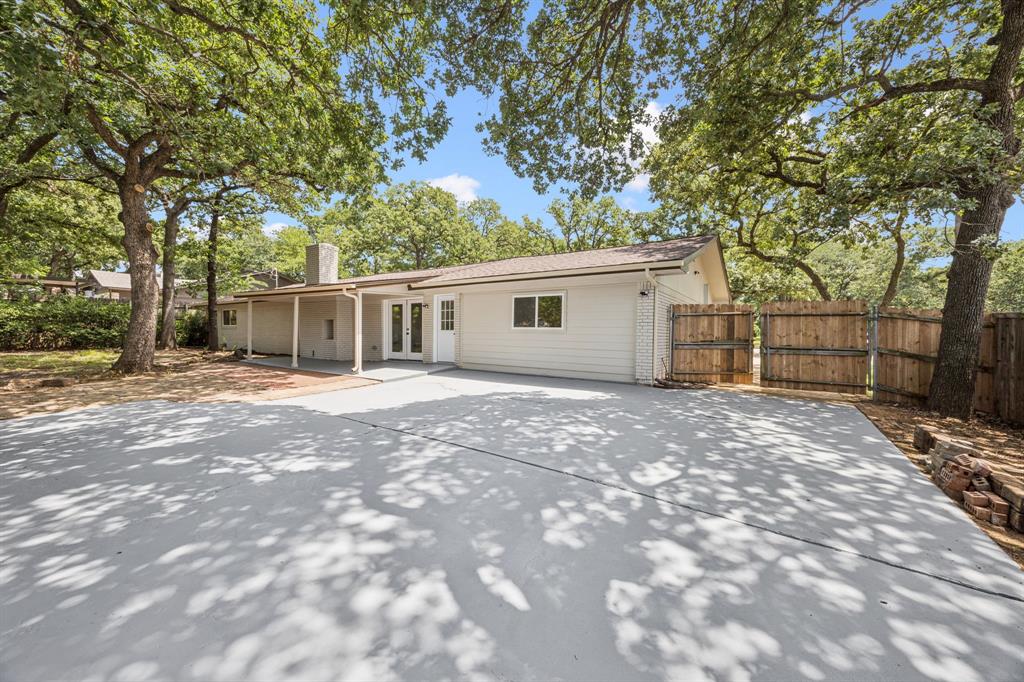 37 Devonshire Bedford, TX 76021 - Photo 38 of 39 a view of a house with a backyard