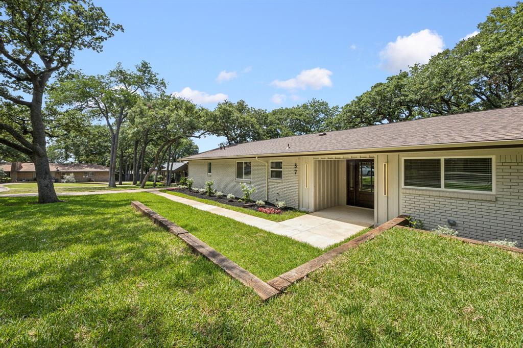 37 Devonshire Bedford, TX 76021 - Photo 5 of 39 a view of a house with a patio