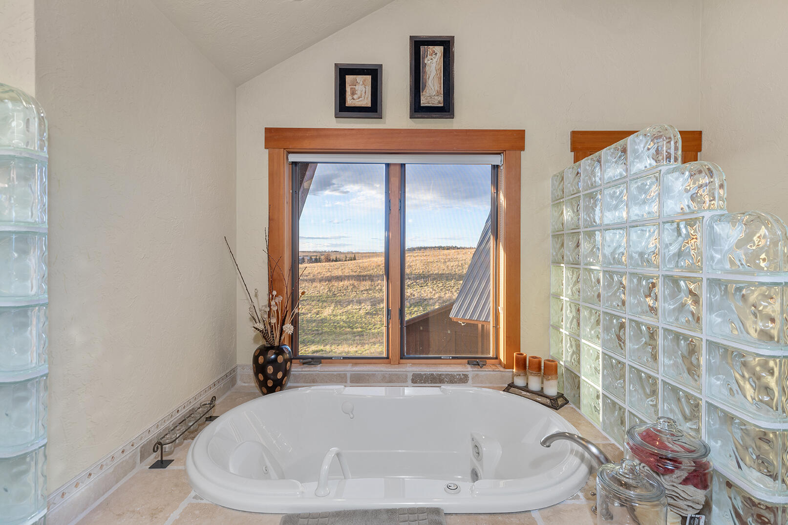 727 West Anderson Road Placerville, CO 81430 - Photo 11 of 31 a white bath tub sitting in a bathroom next to a window