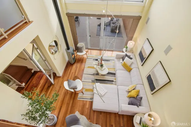 a living room with furniture and a table