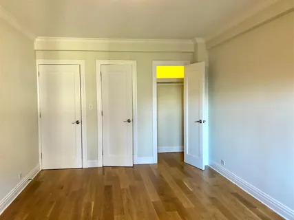 a view of an empty room and window