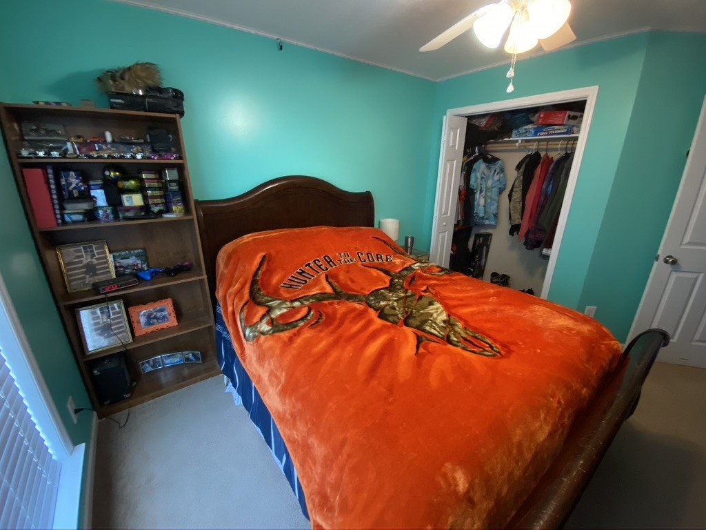 151 Wells Lee Road Elora, TN 37328 - Photo 22 of 30 a bed sitting in a bedroom next to a window