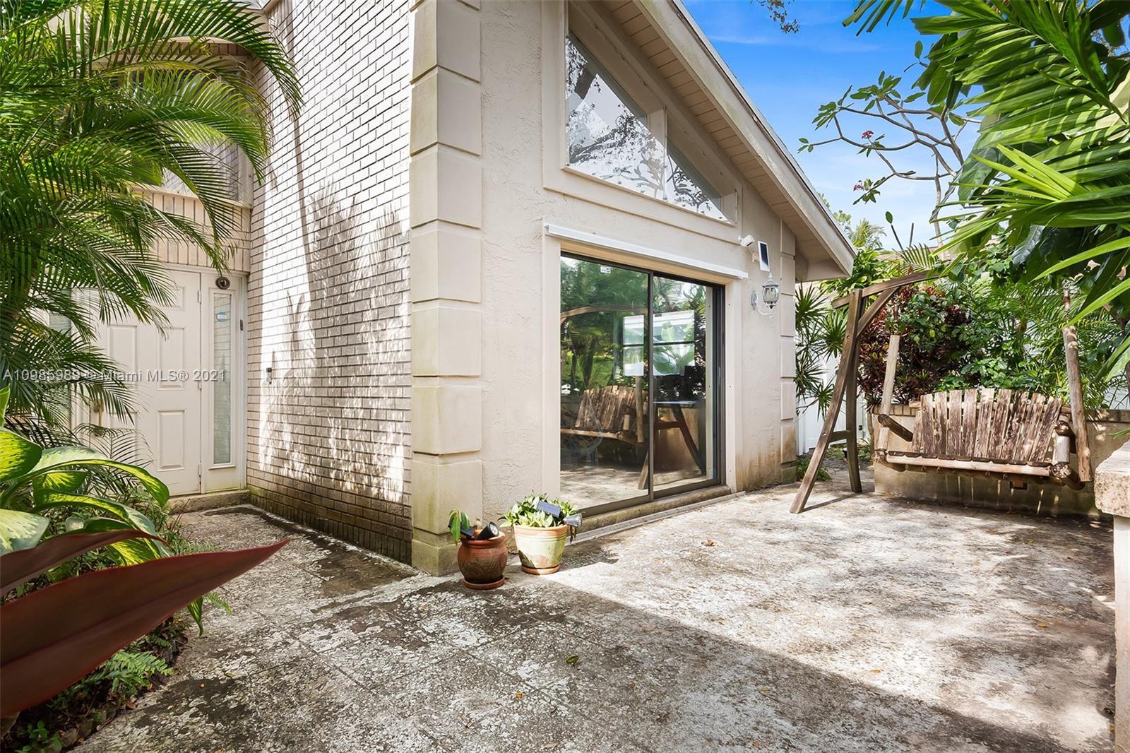 21518 Kapok Circle Boca Raton, FL 33433 - Photo 11 of 30 a view of a house with a patio