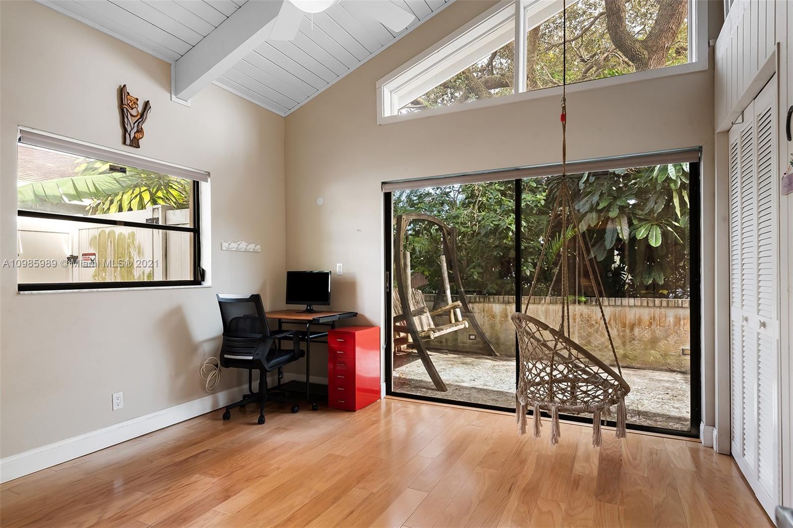 21518 Kapok Circle Boca Raton, FL 33433 - Photo 20 of 30 a view of a workspace with furniture and a window