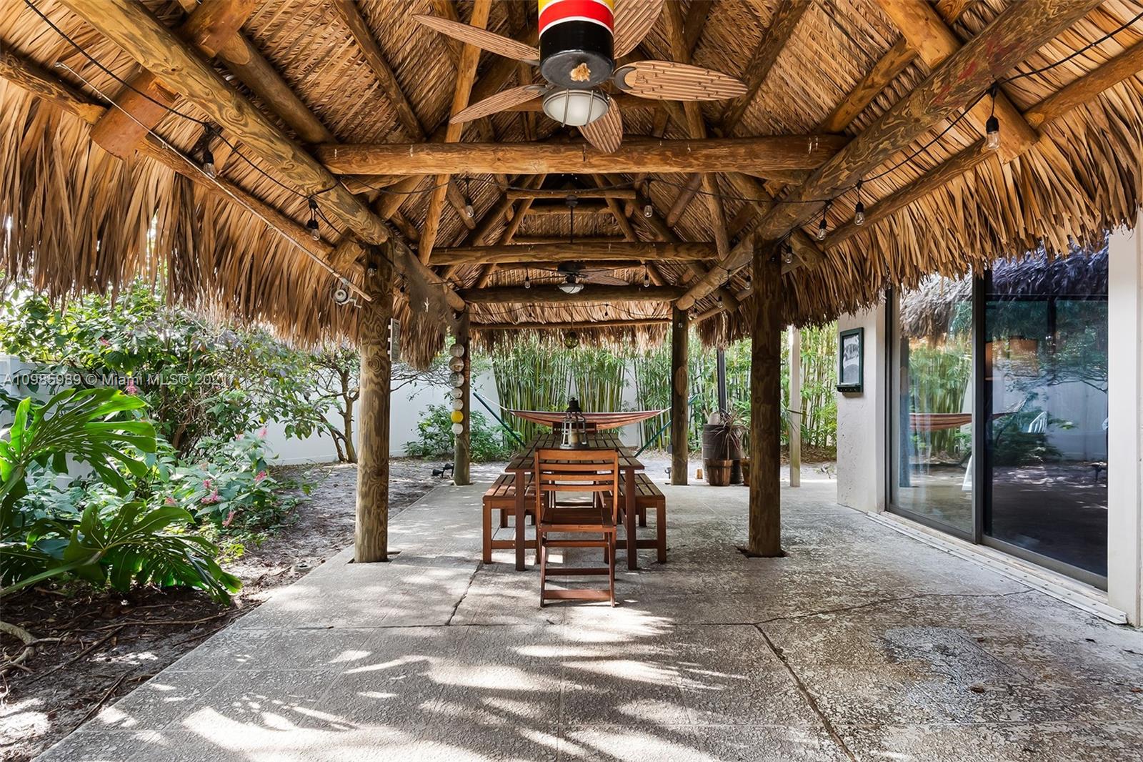21518 Kapok Circle Boca Raton, FL 33433 - Photo 2 of 30 a view of a chairs and table in the patio