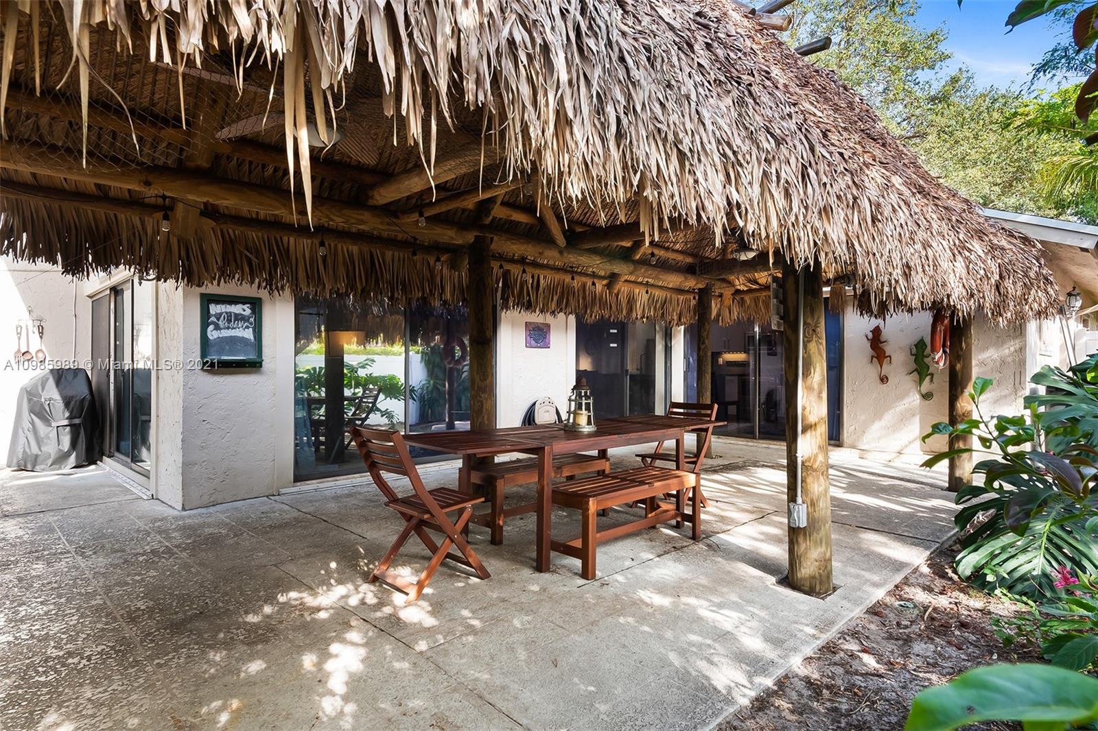 21518 Kapok Circle Boca Raton, FL 33433 - Photo 27 of 30 a view of a chairs and tables in patio
