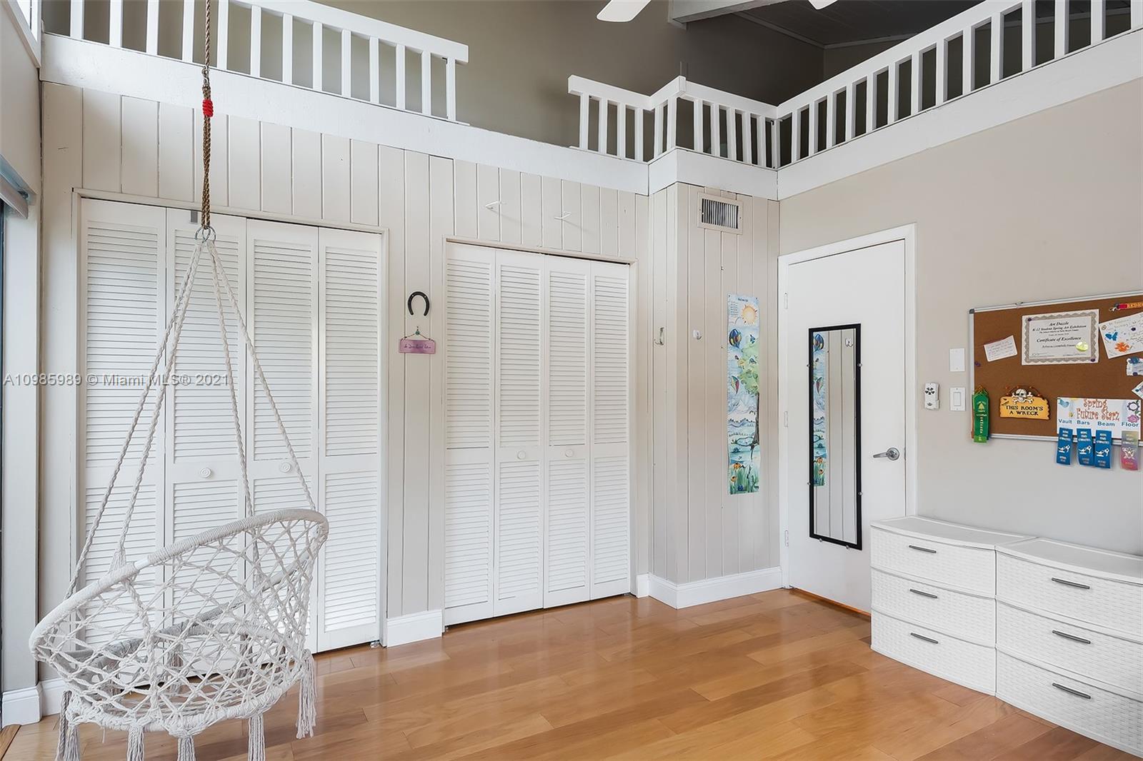21518 Kapok Circle Boca Raton, FL 33433 - Photo 4 of 30 wooden floor with white walls
