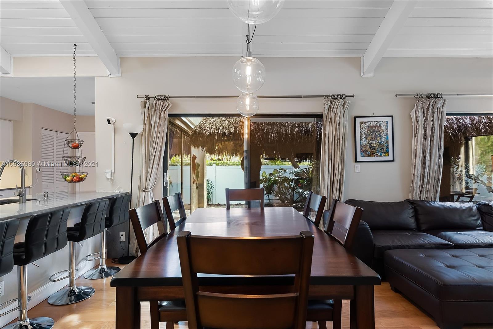 21518 Kapok Circle Boca Raton, FL 33433 - Photo 6 of 30 a view of a dining room with furniture window and outside view