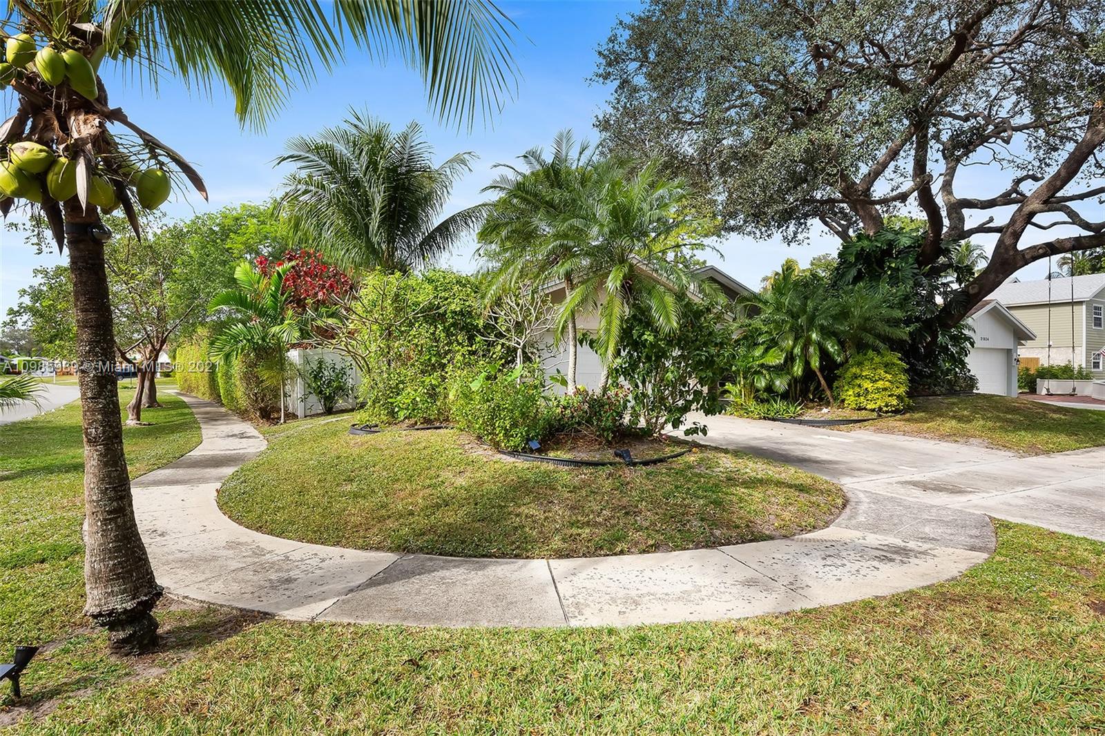21518 Kapok Circle Boca Raton, FL 33433 - Photo 9 of 30 a view of a yard with palm tree