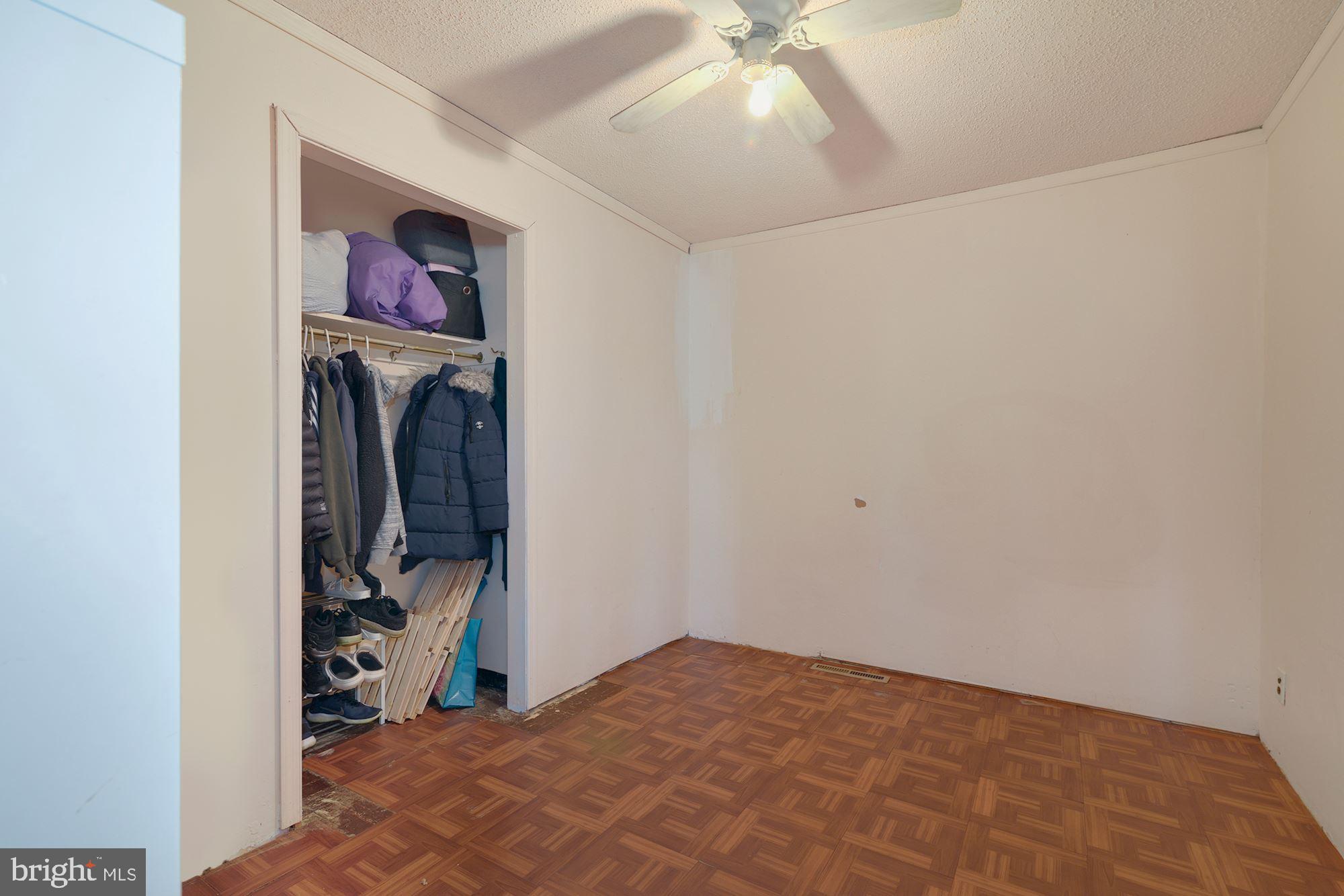 446 Flanders Road Bellmawr, NJ 08031 - Photo 18 of 29 a view of a bedroom with a bed and closet