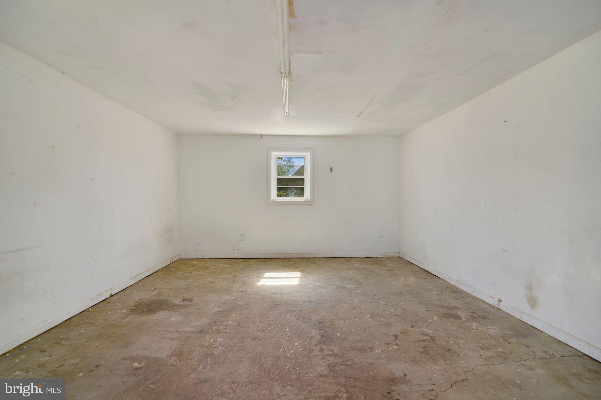 446 Flanders Road Bellmawr, NJ 08031 - Photo 20 of 29 an empty room with a empty space and windows