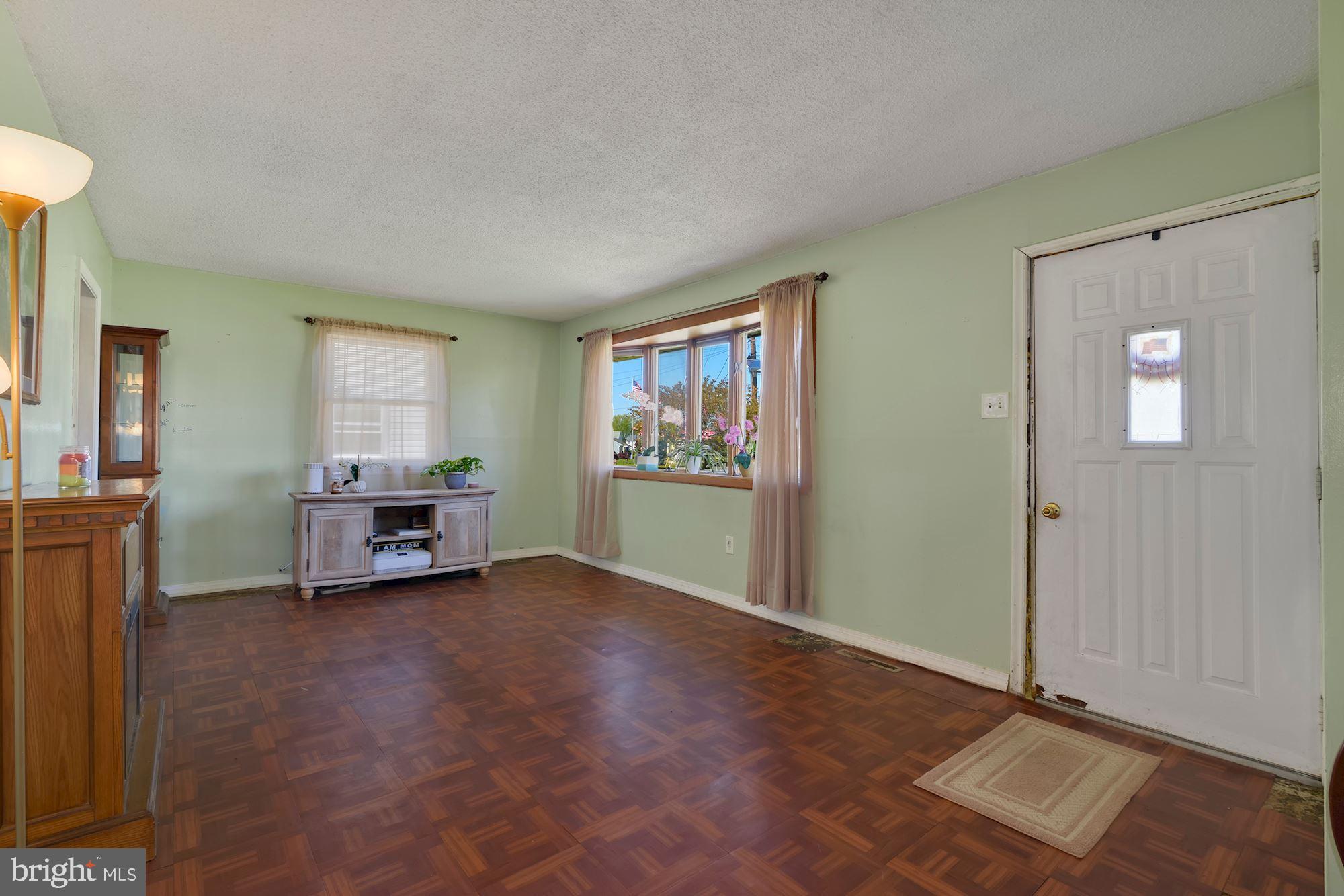 446 Flanders Road Bellmawr, NJ 08031 - Photo 3 of 29 a view of a livingroom with furniture and windows
