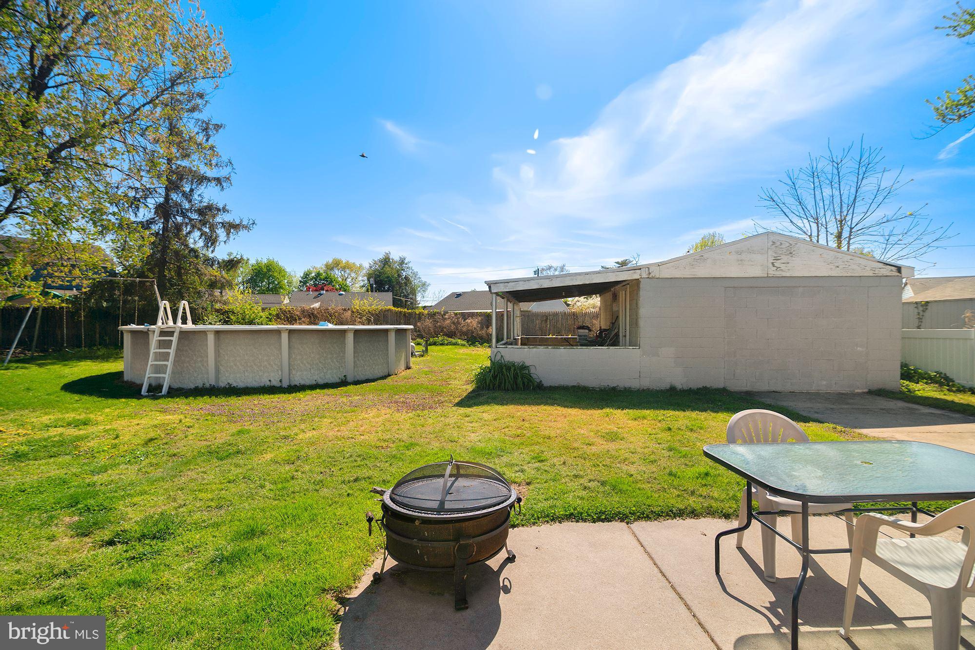 446 Flanders Road Bellmawr, NJ 08031 - Photo 25 of 29 a view of a house with backyard and sitting area