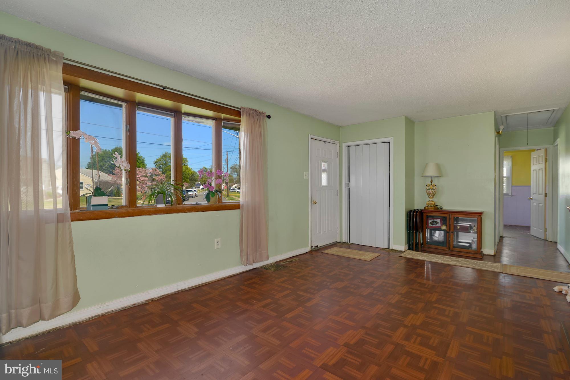 446 Flanders Road Bellmawr, NJ 08031 - Photo 5 of 29 a view of livingroom with furniture and window
