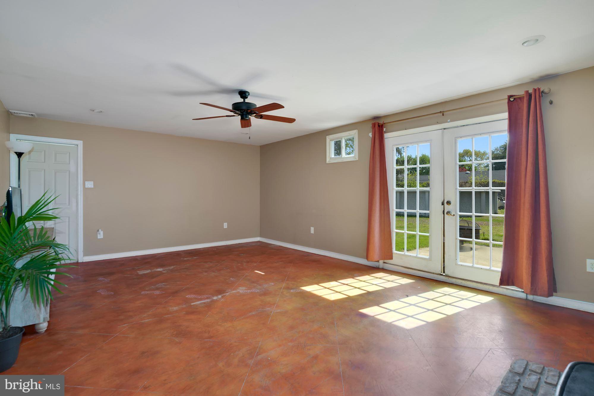 446 Flanders Road Bellmawr, NJ 08031 - Photo 10 of 29 a view of an empty room with a window