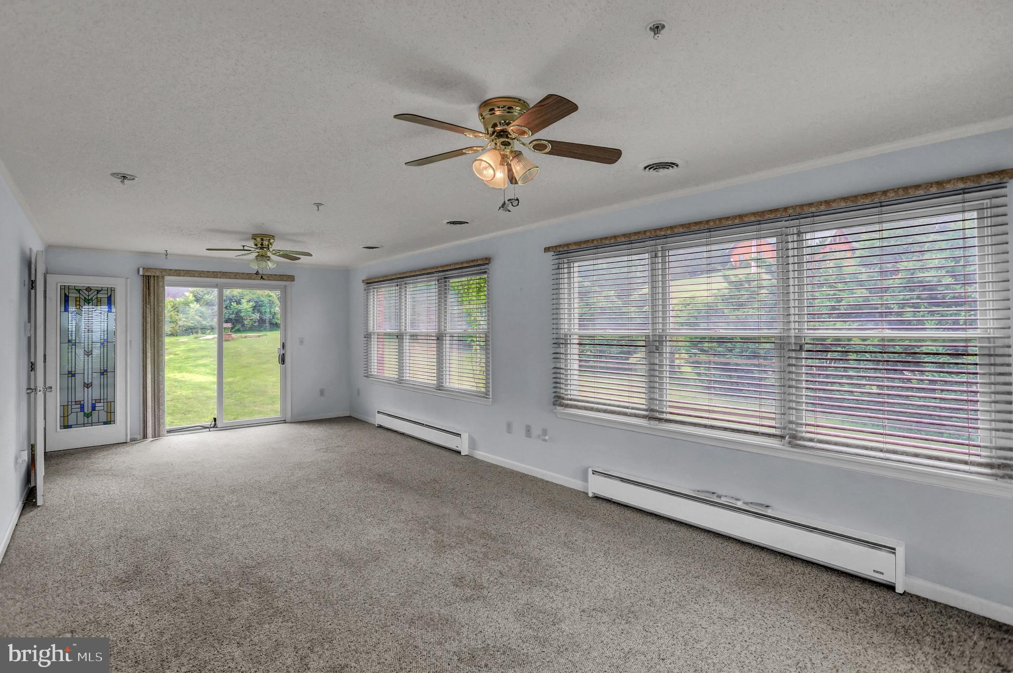 25 Warren Trail Fairfield, PA 17320 - Photo 22 of 42 Family toom towards west with sliding doors
