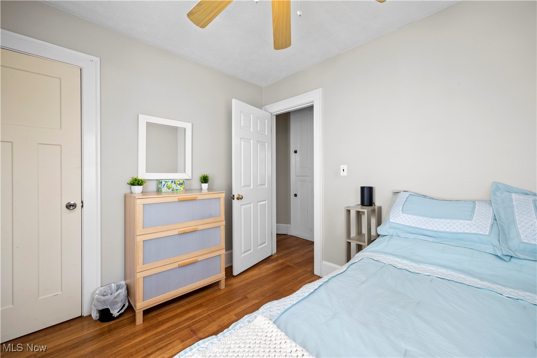 1624 Edgefield Road Lyndhurst, OH 44124 - Photo 11 of 26 Bedroom with baseboards, a ceiling fan, and wood finished floors