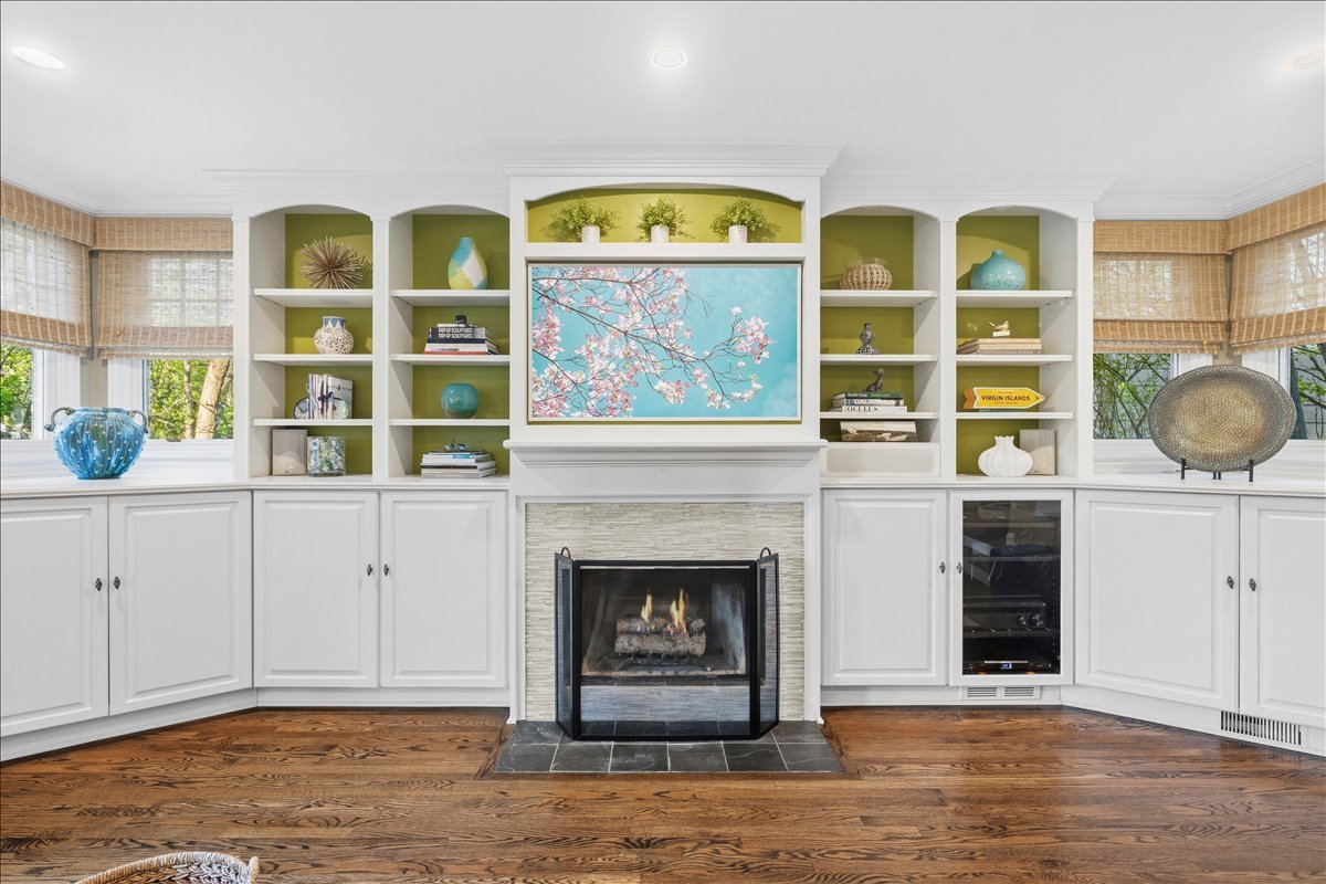 1082 Ash Street Winnetka, IL 60093 - Photo 15 of 54 a view of living room with a fireplace and a floor to ceiling window