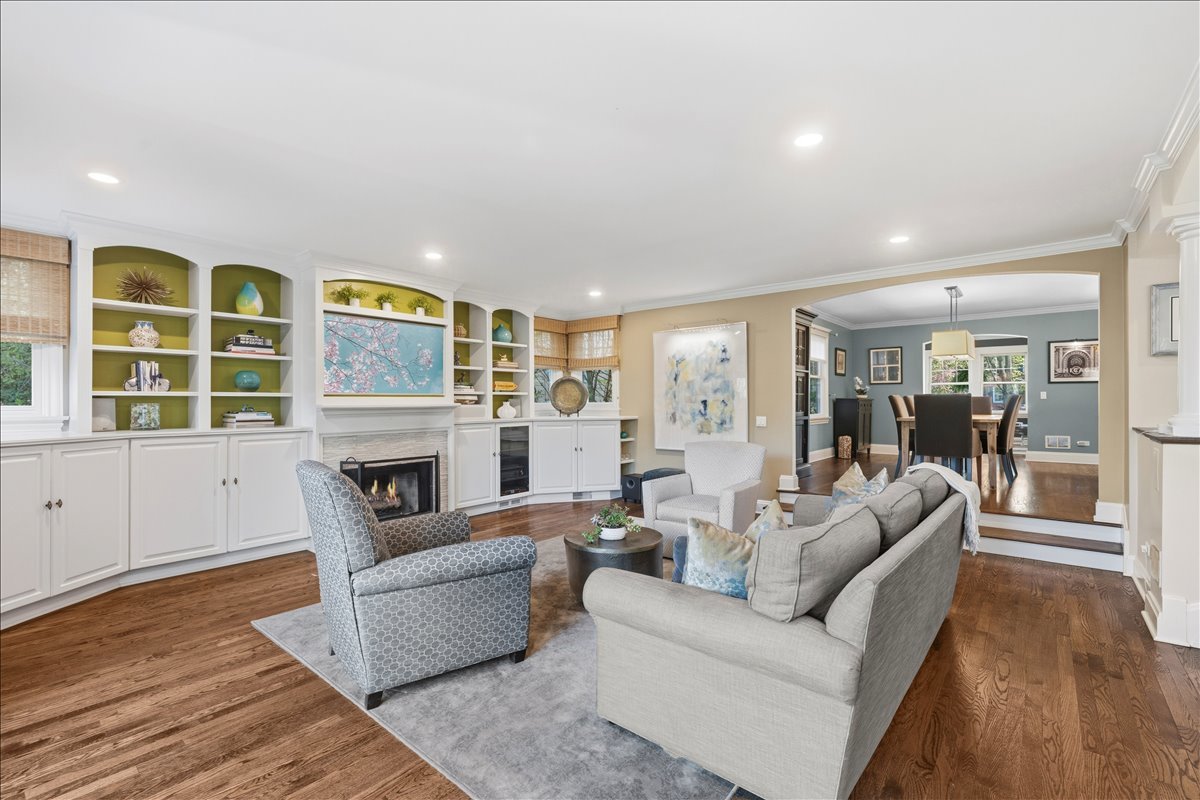 1082 Ash Street Winnetka, IL 60093 - Photo 16 of 54 a living room with furniture and a fireplace
