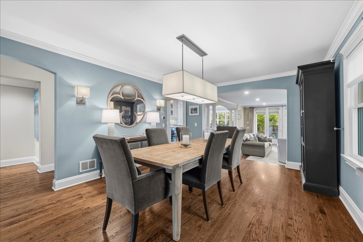 1082 Ash Street Winnetka, IL 60093 - Photo 19 of 54 a view of a dining room with furniture window and wooden floor