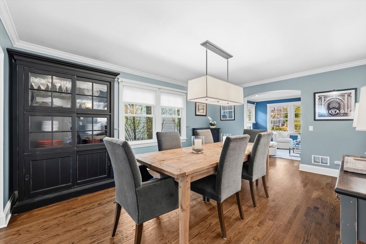 1082 Ash Street Winnetka, IL 60093 - Photo 20 of 54 a view of a dining room with furniture window and wooden floor