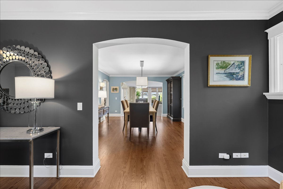 1082 Ash Street Winnetka, IL 60093 - Photo 23 of 54 a dining room with furniture and wooden floor