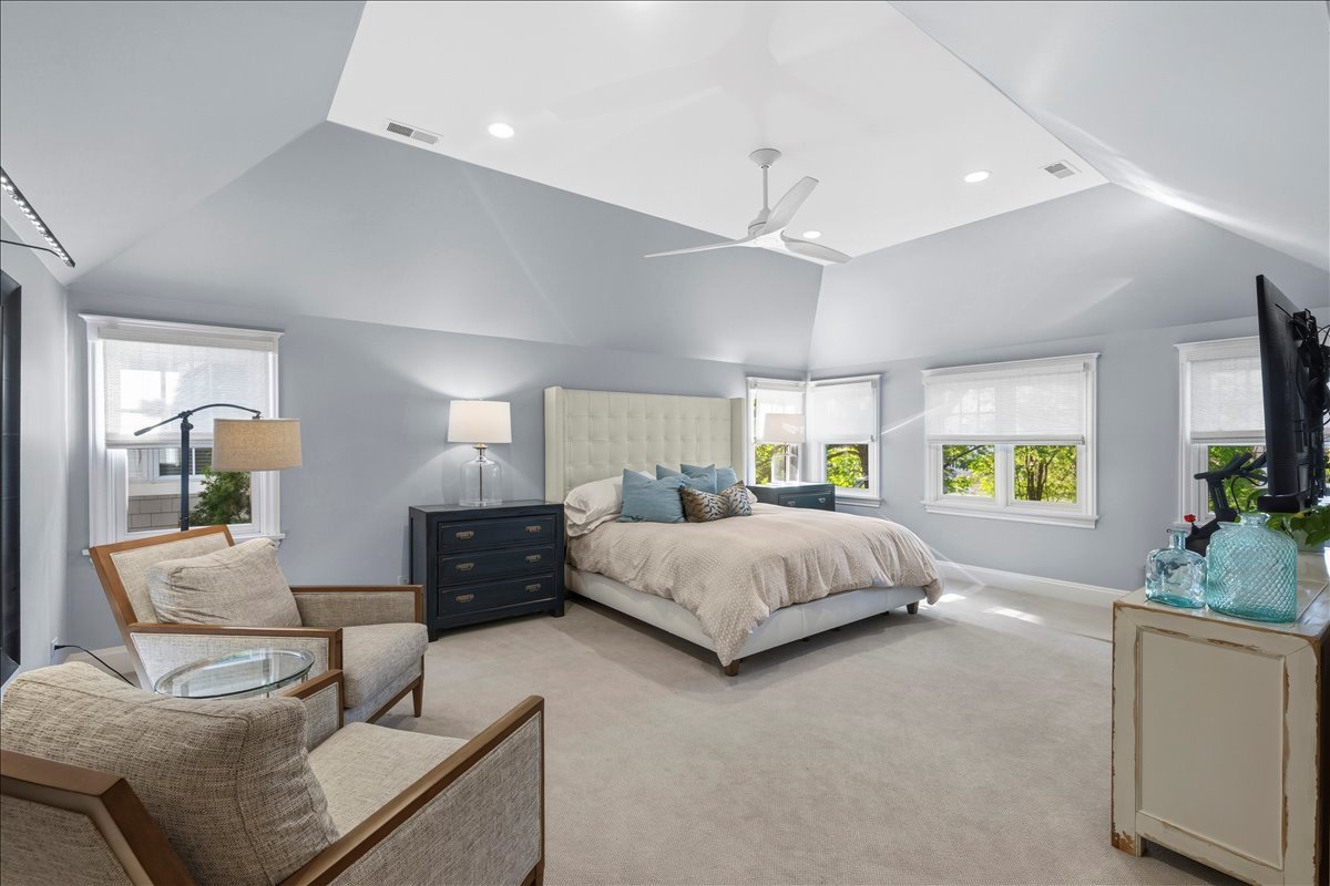 1082 Ash Street Winnetka, IL 60093 - Photo 27 of 54 a spacious bedroom with a bed and window