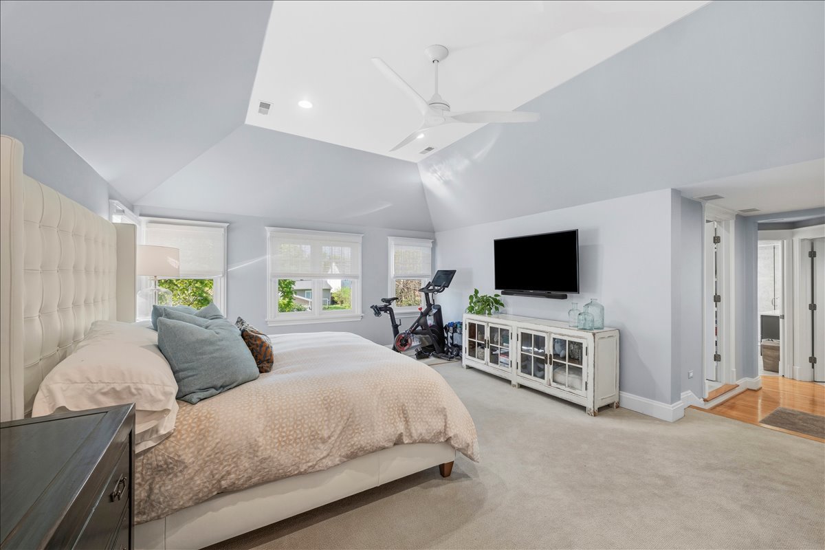 1082 Ash Street Winnetka, IL 60093 - Photo 28 of 54 a bedroom with a bed and a flat screen tv