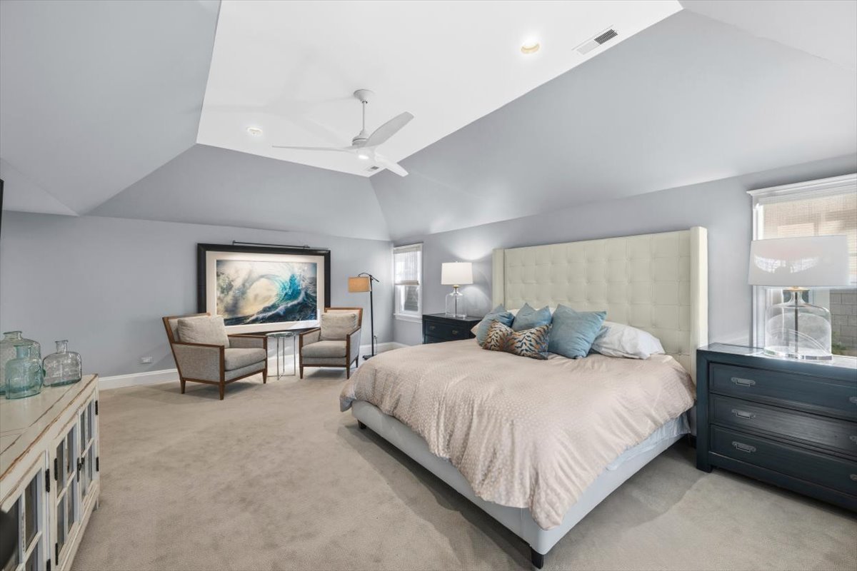 1082 Ash Street Winnetka, IL 60093 - Photo 29 of 54 a bedroom with a bed a couch and dresser