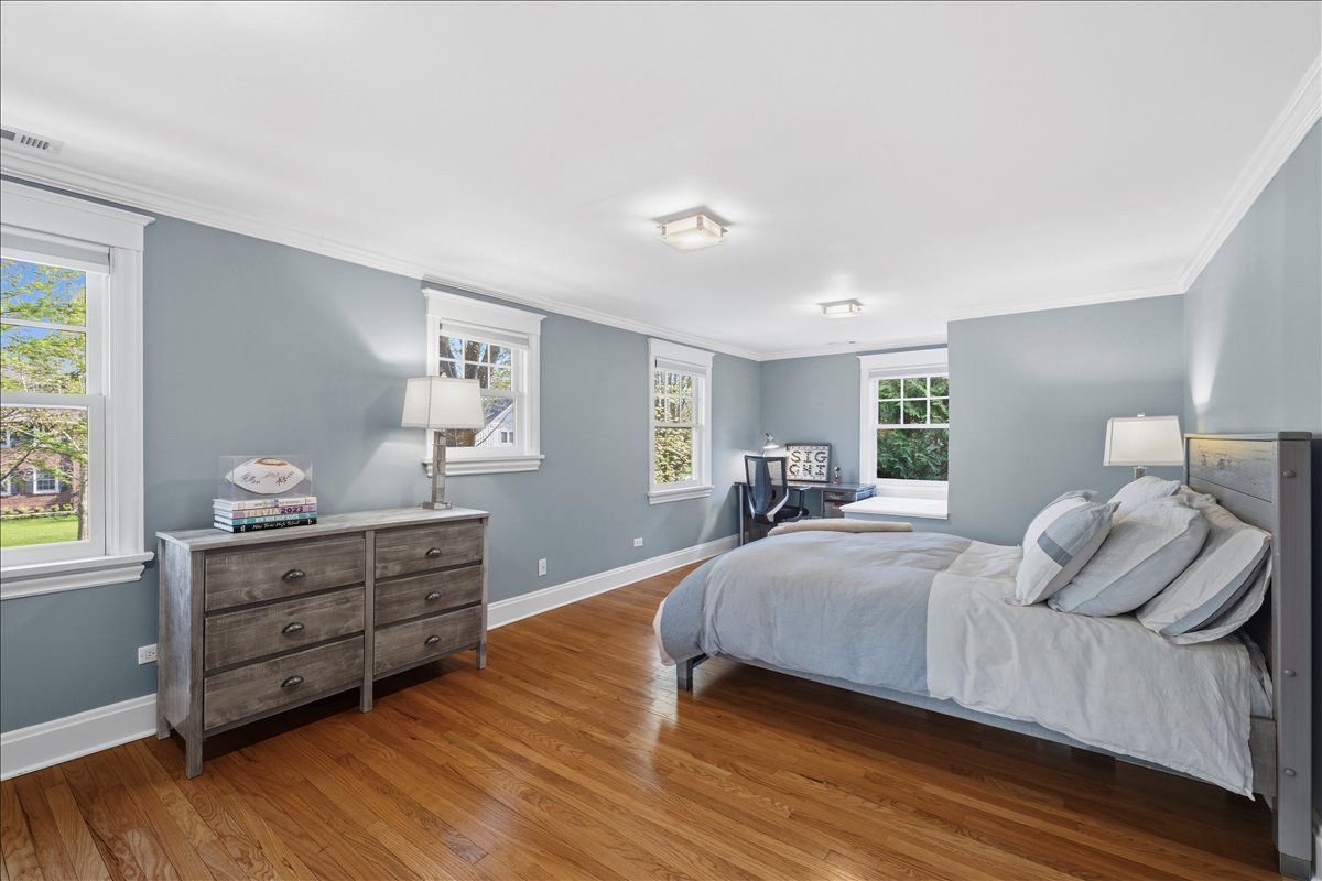 1082 Ash Street Winnetka, IL 60093 - Photo 37 of 54 a bedroom with a bed and window