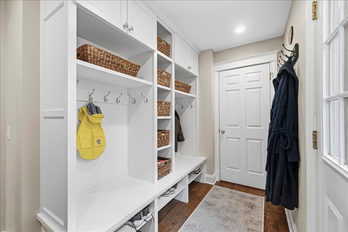 1082 Ash Street Winnetka, IL 60093 - Photo 43 of 54 a view of walk in closet with clothes and shoes