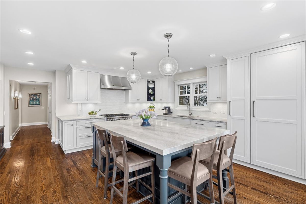 1082 Ash Street Winnetka, IL 60093 - Photo 6 of 54 a kitchen with a table and chairs in it
