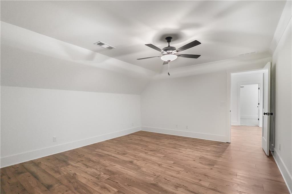 2113 Stonegate Way Monroe, GA 30656 - Photo 33 of 43 wooden floor in an empty room
