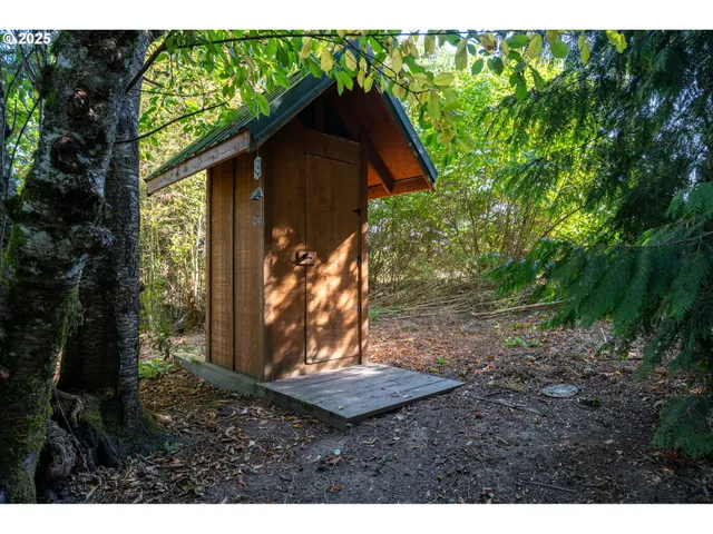a view of a lake with a house in the background