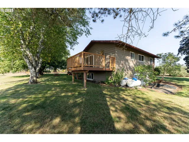a view of swimming pool with a yard