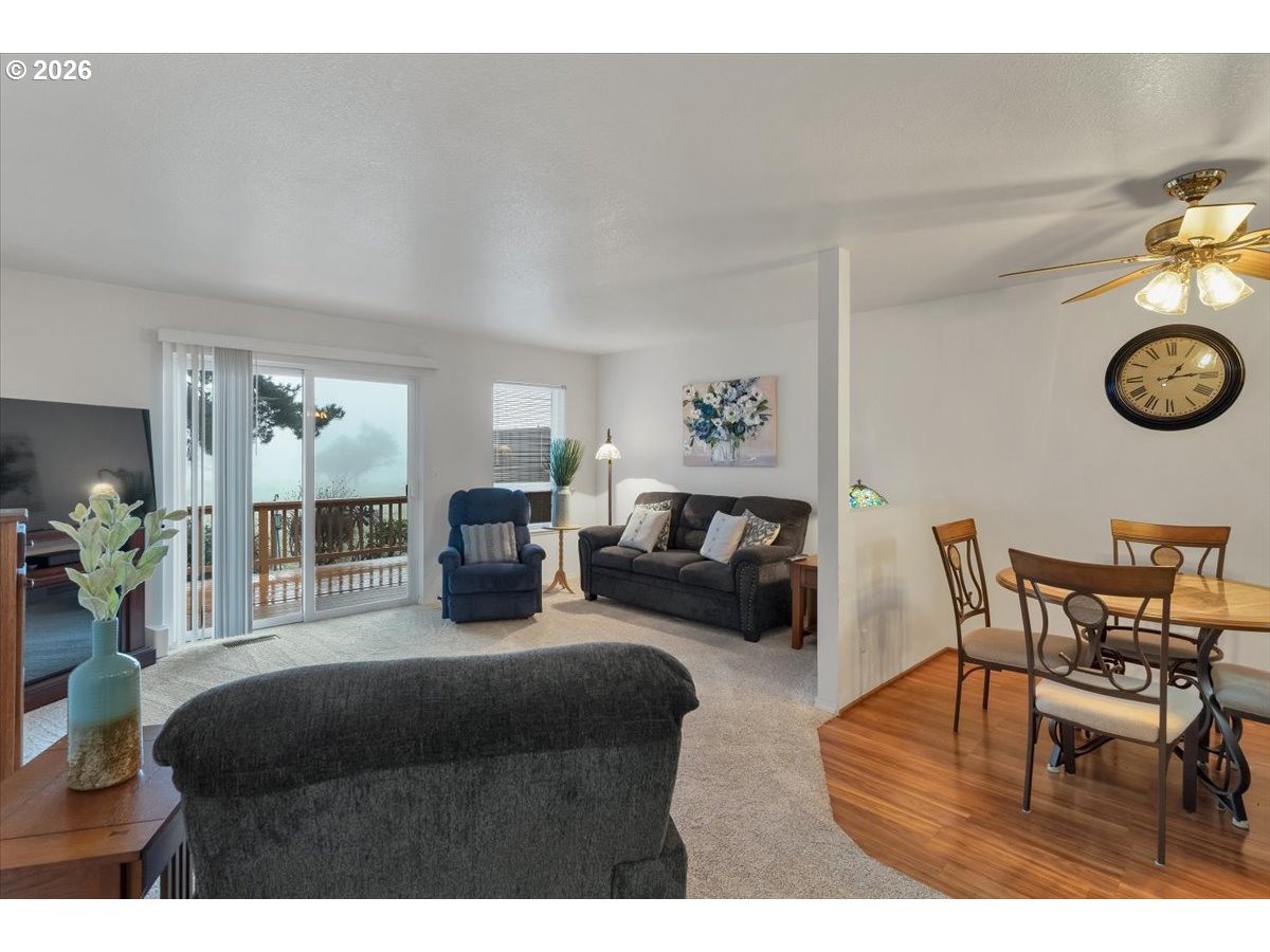 468 Harris Lane Oregon City, OR 97045 - Photo 16 of 34 a living room with furniture and a clock