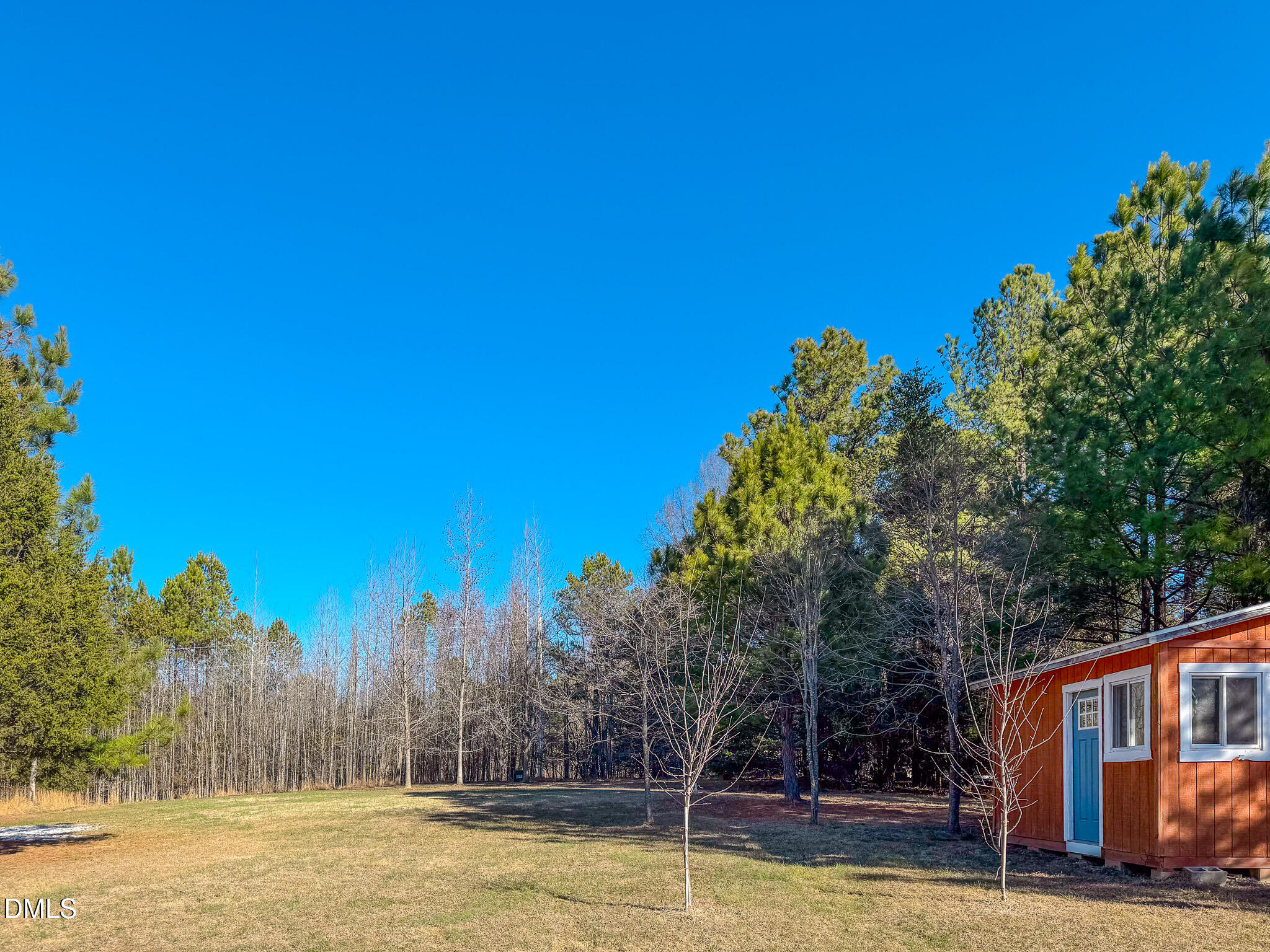 125 Ninovan Place Rougemont, NC 27572 - Photo 11 of 57 a view of a swimming pool with an outdoor space and seating area