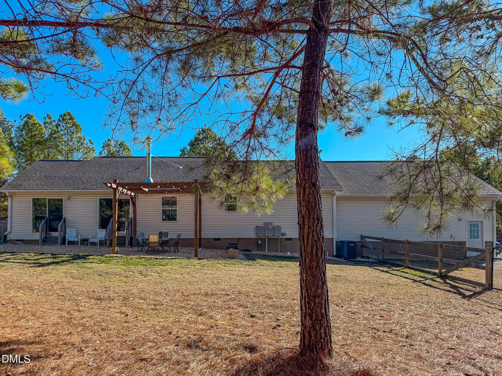 125 Ninovan Place Rougemont, NC 27572 - Photo 18 of 55 a view of a house with backyard and trees