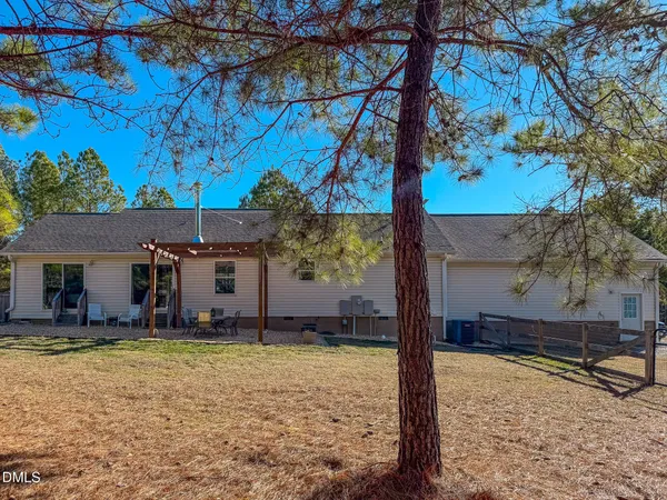 a view of a balcony with trees
