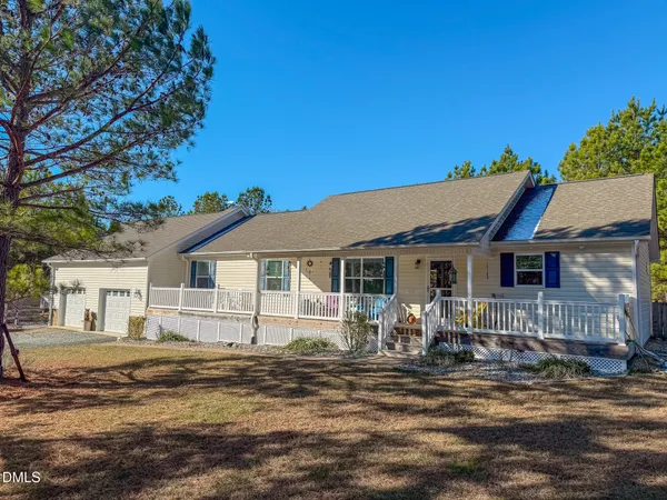 a front view of a house with a porch
