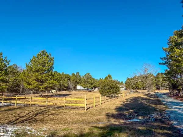 a view of a bathroom with a toilet and a shower