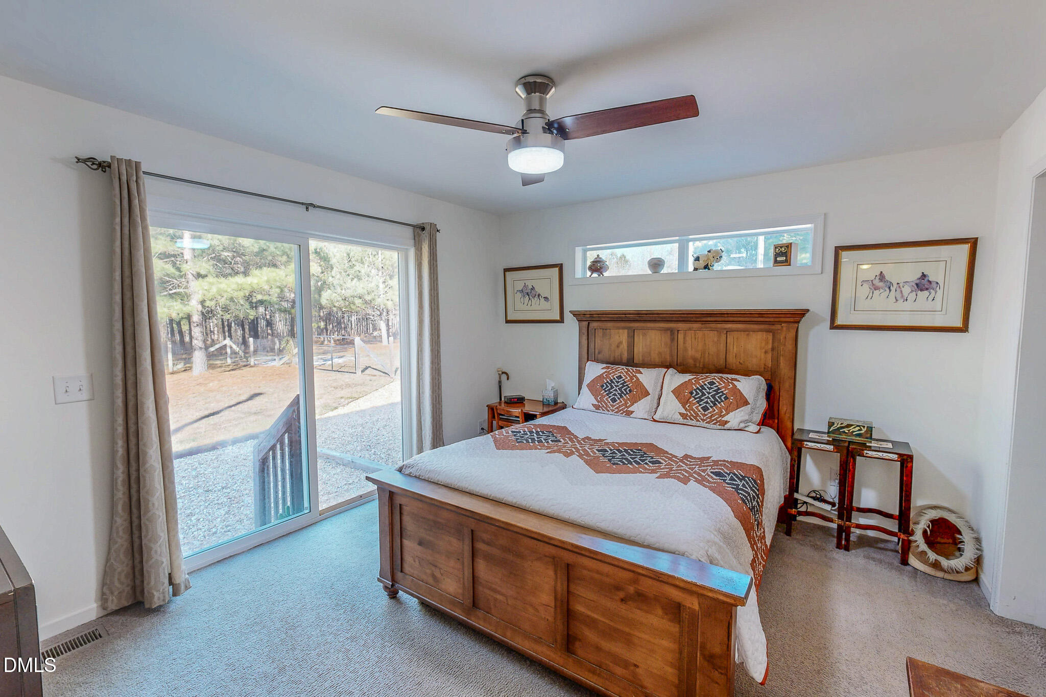 125 Ninovan Place Rougemont, NC 27572 - Photo 26 of 57 a bedroom with a bed and a large window