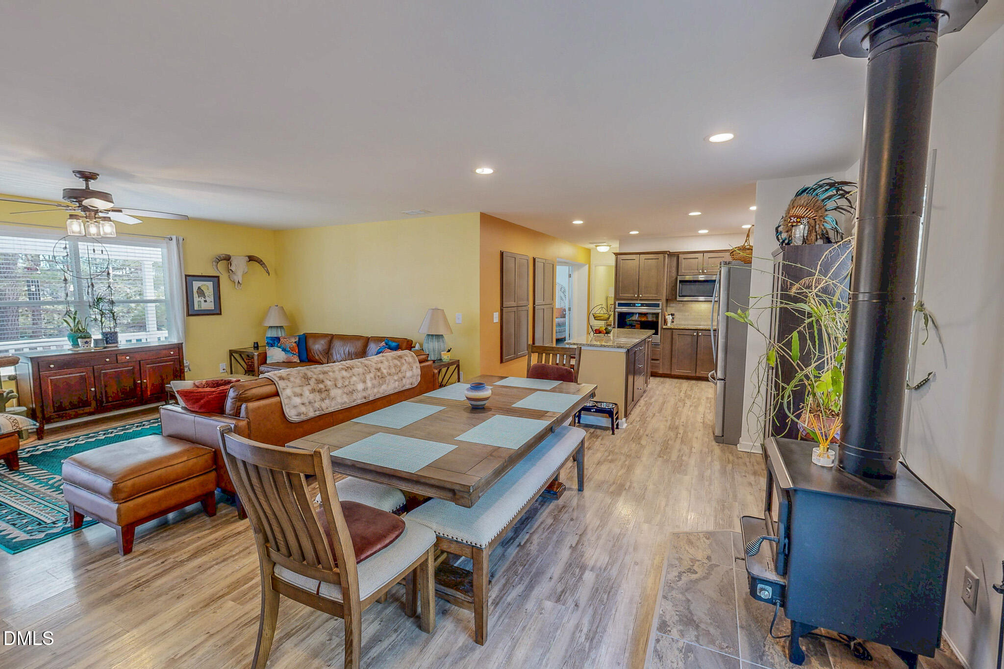 125 Ninovan Place Rougemont, NC 27572 - Photo 32 of 55 a view of a dining room with furniture window and wooden floor