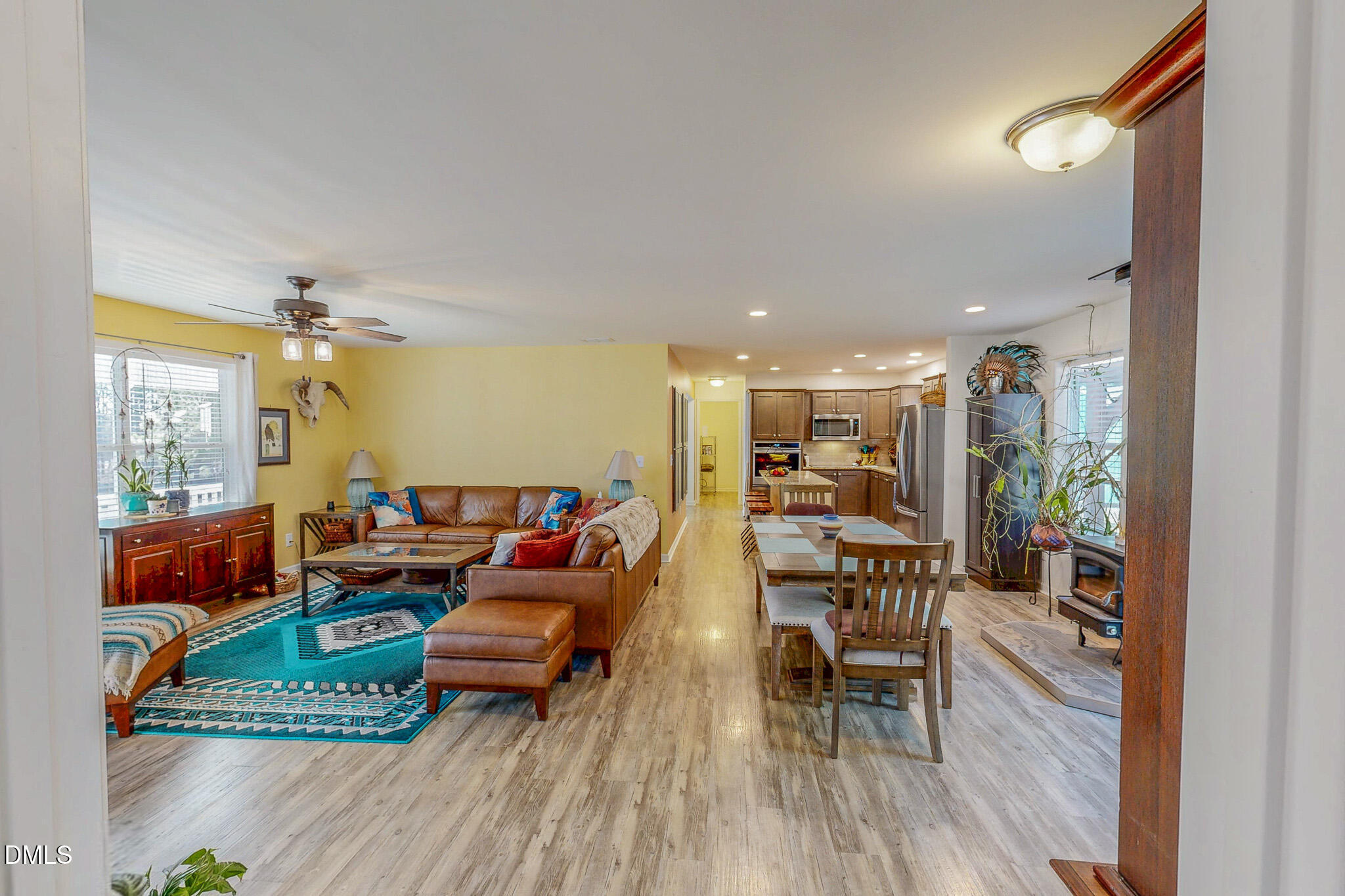 125 Ninovan Place Rougemont, NC 27572 - Photo 33 of 57 a living room with furniture and a wooden floor