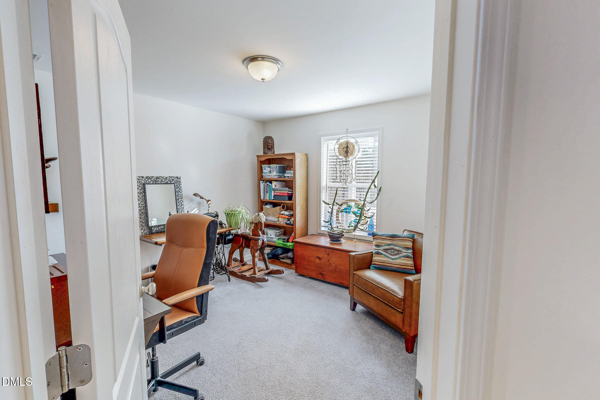 125 Ninovan Place Rougemont, NC 27572 - Photo 36 of 55 a room with furniture and a window