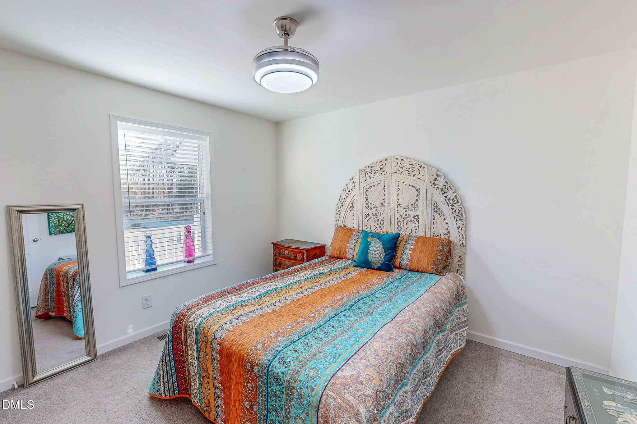 125 Ninovan Place Rougemont, NC 27572 - Photo 40 of 55 a bedroom with a bed and a window