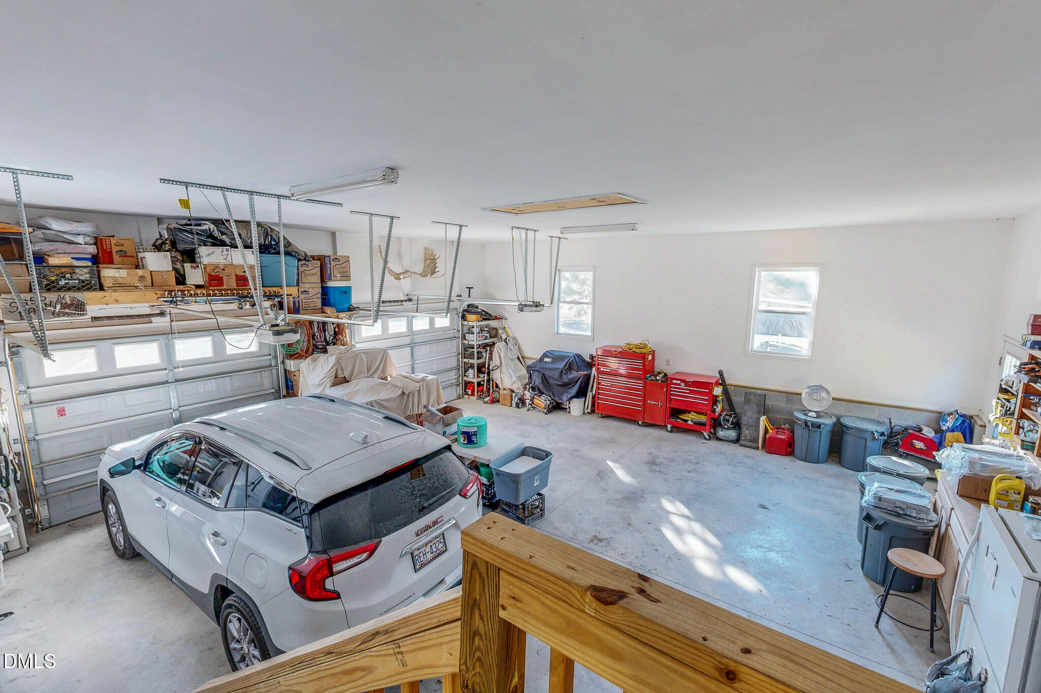 125 Ninovan Place Rougemont, NC 27572 - Photo 43 of 55 a living room with furniture and a flat screen tv