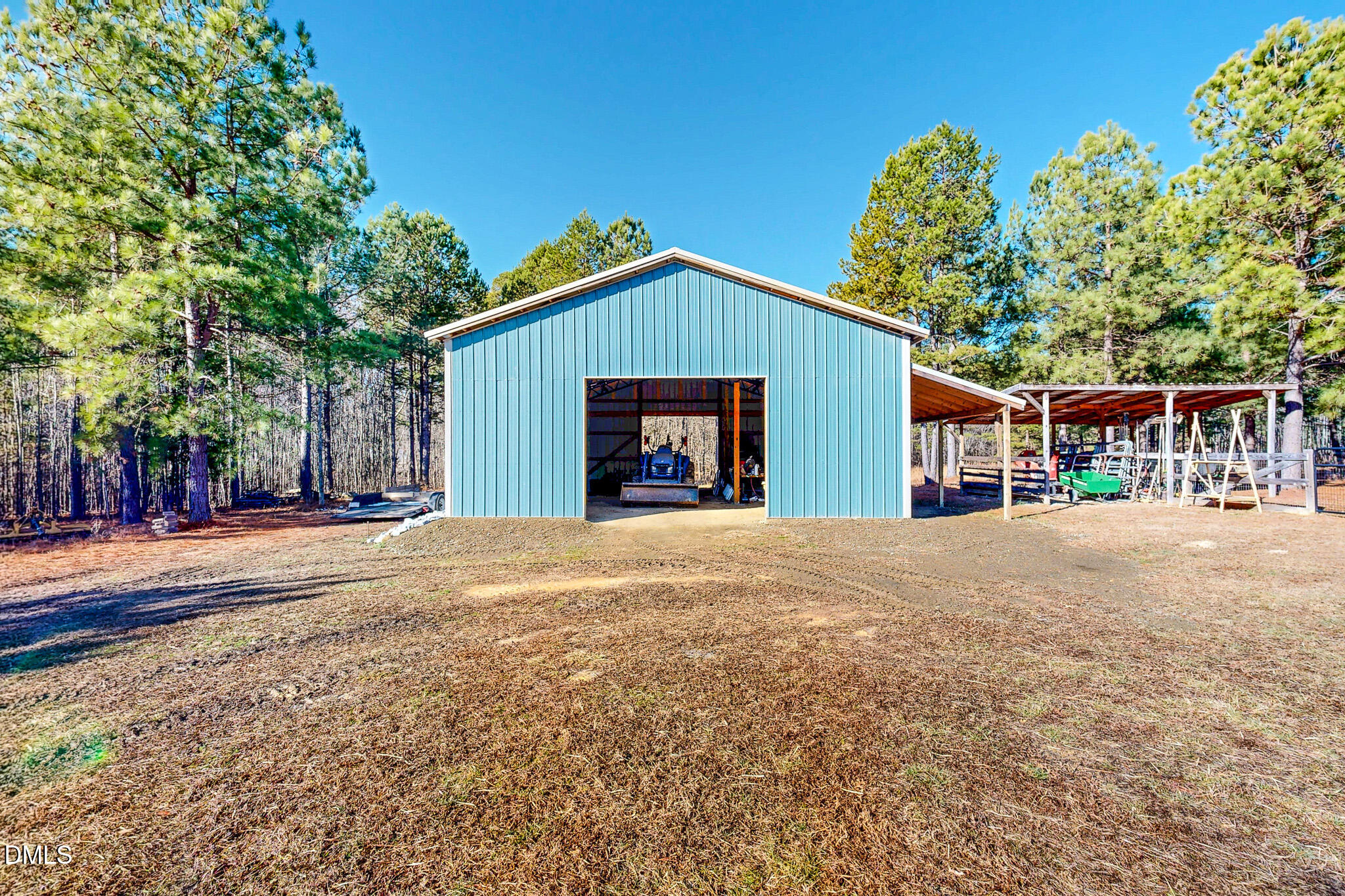125 Ninovan Place Rougemont, NC 27572 - Photo 52 of 57 a front view of a house with a yard and garage